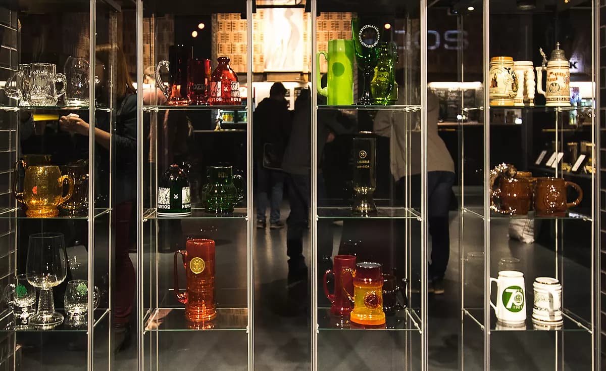 A display case of commemorative tankards at the first Mining and Metallurgy Beer Festival